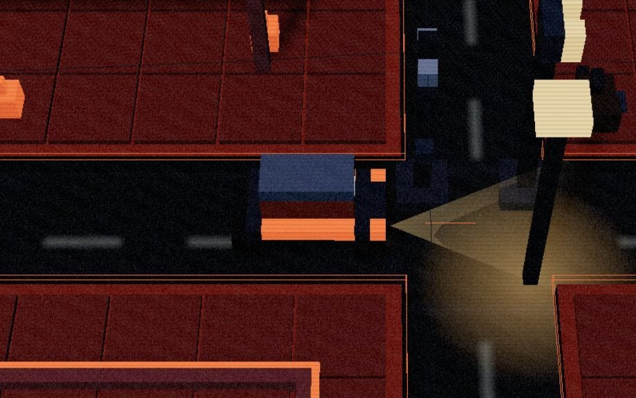 A supply truck on the street between two awake Ember blocks at night